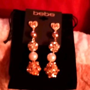 BeBe Gold Dangling Post with Flowing Decor
